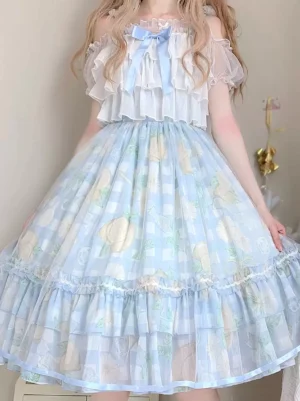 Front straight full-body shot of blue floral lolita dress with off-shoulder ruffled top and structured blue bow chest decoration on long-haired model