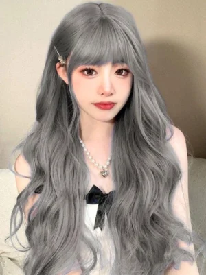 Blue-gray long wavy Lolita wig with air bangs worn by model, frontal view showcasing the color depth and wavy texture