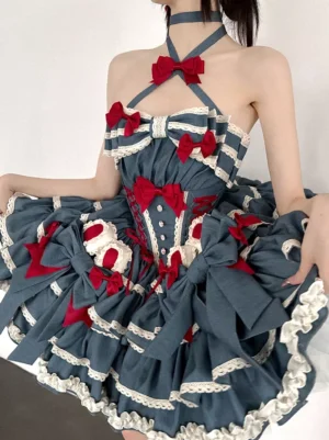 Blue halter sweet lolita dress front view with red bows and layered white lace ruffle skirt on female model