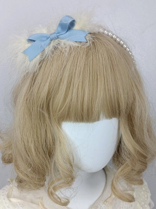 Blue lolita pearl headband with fluffy white feather and satin bow, sweet rococo-inspired headdress, front three-quarter angle