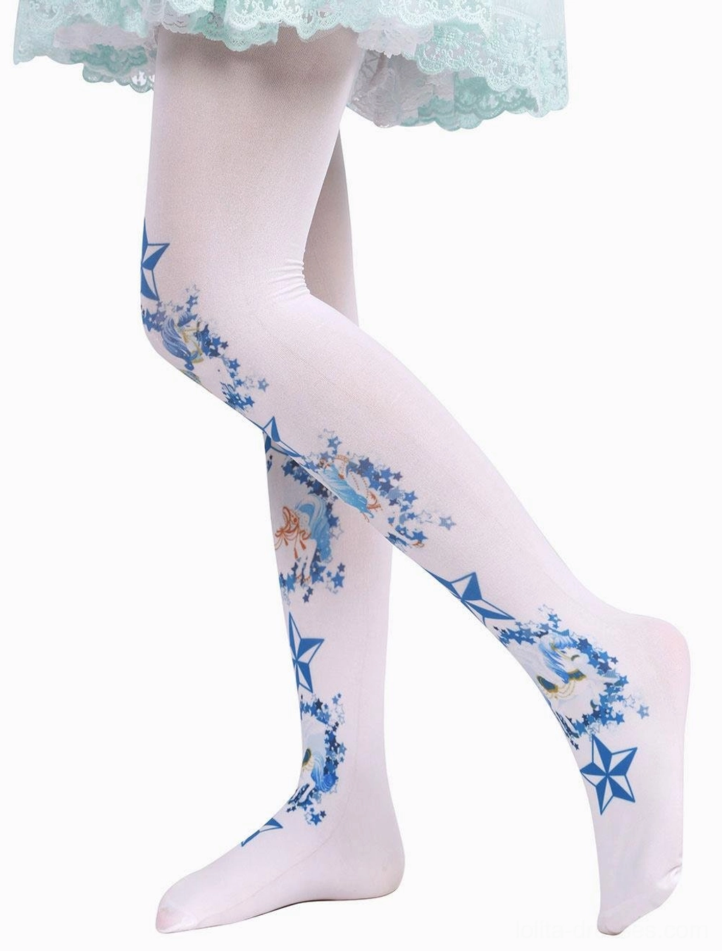 Side view of blue Lolita socks with fairy tale designs and star prints crossed legs mint green skirt hem sheer fitted fabric