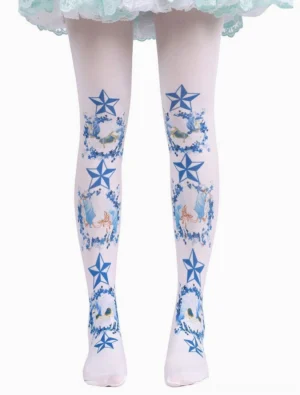 Blue printed Lolita socks with pentagram stars and fairy tale prints worn with mint green lace Lolita skirt front view both legs