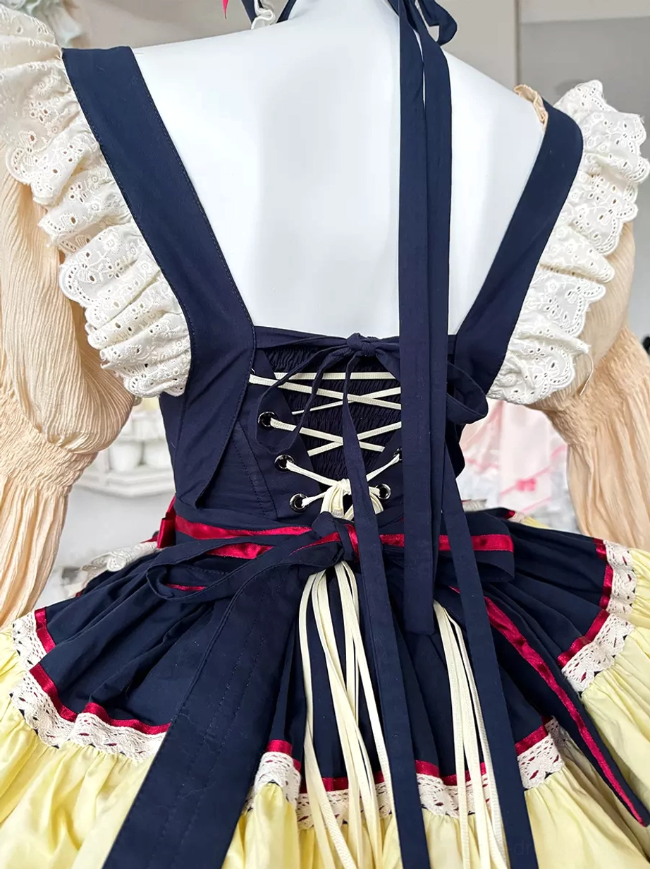 Blue rabbit maid lolita dress detail close-up showing fabric quality, ruffled construction, bow embellishments, and sweet lolita style craftsmanship