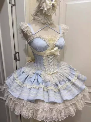 Blue ballet-inspired sweet lolita dress front view with lace-up corset closure and layered ruffled skirt displayed on mannequin