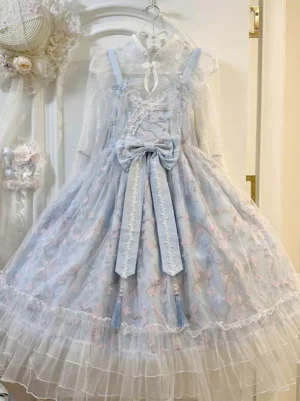 Light sky blue sweet lolita JSK dress with floral embroidery and tiered tulle skirt front view hanging display