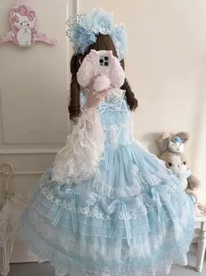 Blue sweet lolita sleeveless dress with ruffles and bow accents, half-body mirror selfie showing lace trims and blue headwear coordination