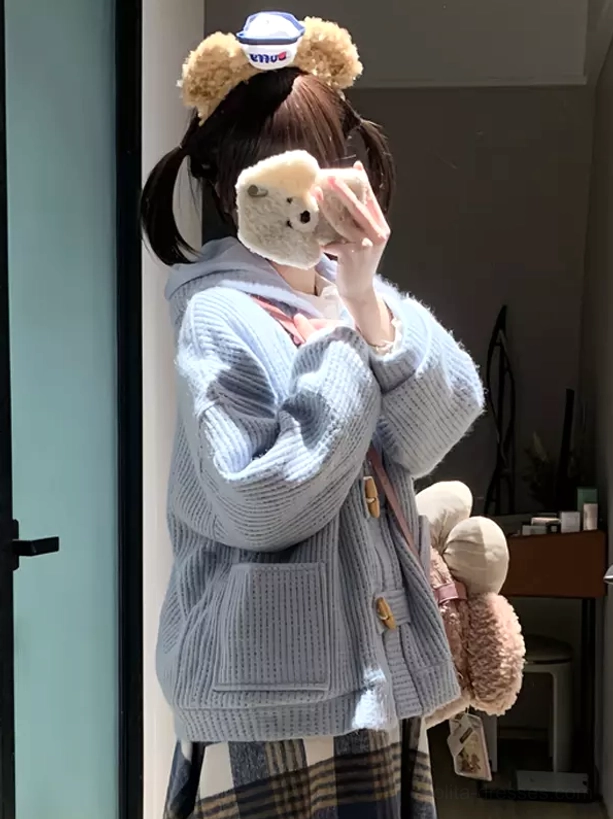 powder blue rococo lolita toggle coat back oblique view showing hooded design and waffle knit texture with plush pendant accessory