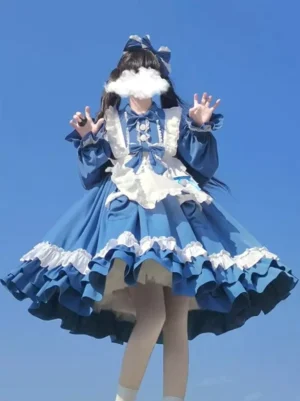 Blue and white sweet lolita OP dress with layered ruffled skirt, puff sleeves, and detachable white maid apron, front view with bow collar details