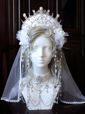 Bridal lolita crown headpiece front view with white tulle veil, silver crystal pearl crown, purple fabric flowers, and cascading dangle chain jewelry set on blonde mannequin head