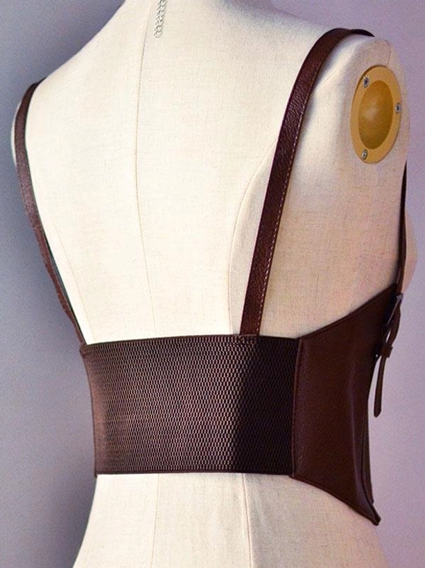 Back view of brown steampunk lolita corset bustier featuring woven elastic back panel, leather side panels and adjustable shoulder straps