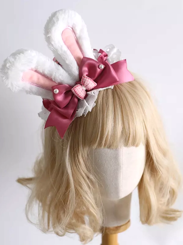Bunny ear lolita headdress three-quarter side angle view showing white fluffy ears rose bow and lace trim details on blonde curly wig lolita fashion