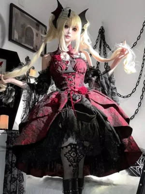 Three-quarter front view of Gothic Lolita jumper skirt dress with burgundy and black coloring displaying lace overlay details and tiered skirt construction worn indoors