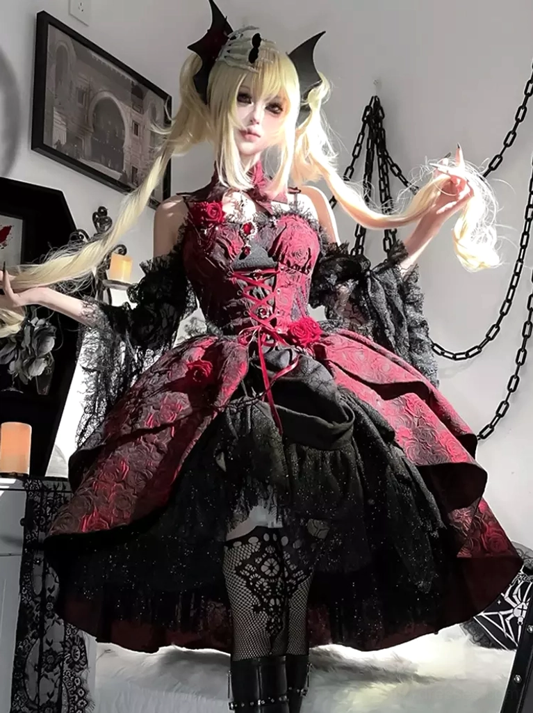 Three-quarter front view of Gothic Lolita jumper skirt dress with burgundy and black coloring displaying lace overlay details and tiered skirt construction worn indoors