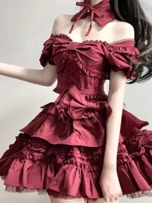 Full front view of burgundy lace-up classic lolita dress showing complete silhouette with tiered ruffle skirt, big waist bow, and tulle underlayer hem