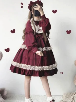Burgundy classic Lolita OP dress with ruffled lace and matching bow full-body view with ruffled socks and lolita shoes coordinate