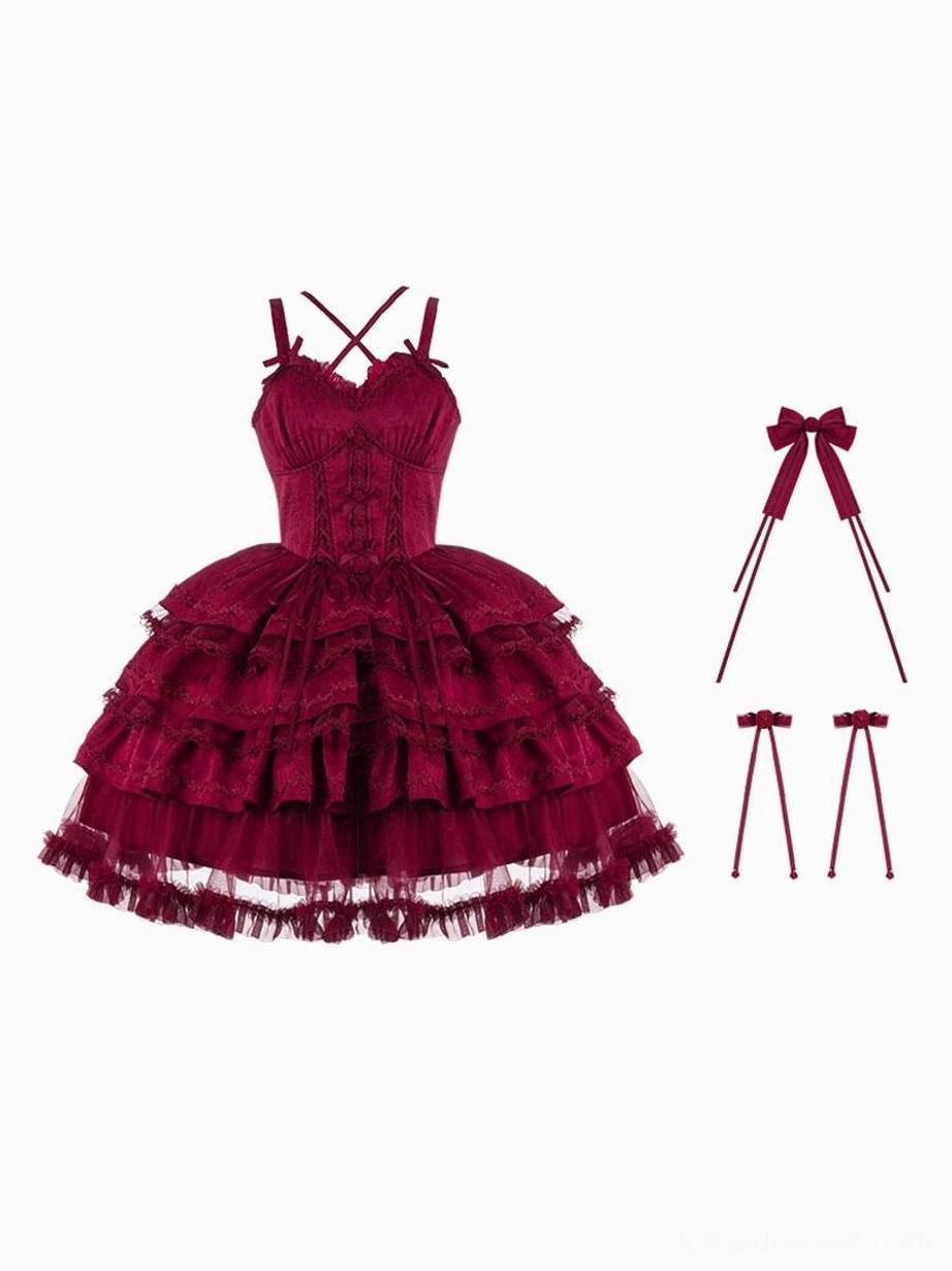 Burgundy gothic lolita dress set flat-lay white background tiered ruffled skirt crisscross camisole matching bow accessories complete ensemble