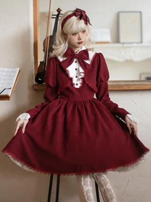 Burgundy gothic lolita dress three-quarter front angle showing white ruffled placket puff sleeves and knee-length flared skirt design