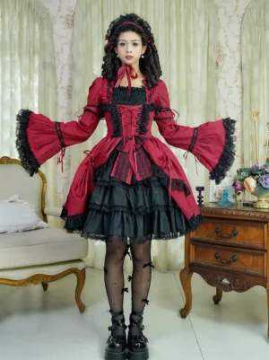 Burgundy Gothic Lolita mini dress with ruffled trumpet sleeves and corset bodice front view on model