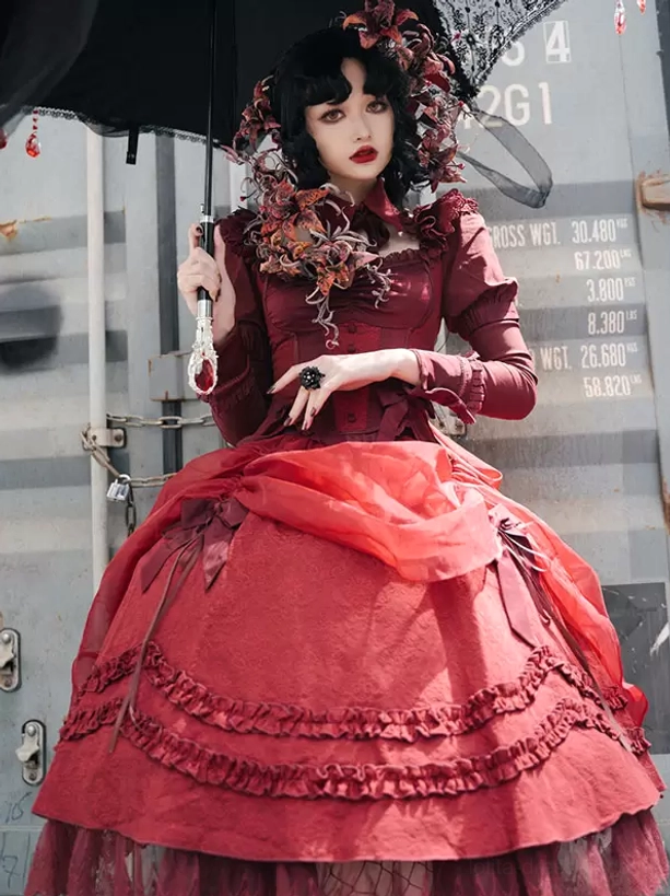 Burgundy Red Gothic Lolita Skirt with Layered Ruffles and Long Sleeves - Industrial Backdrop Front View
