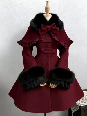 Burgundy Gothic Lolita wool coat with detachable ruffled cape and black faux fur trim, front studio display on dress form