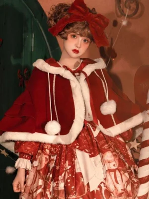 Burgundy lolita cloak poncho with white plush trim and pom-pom decorations front view model wearing vintage dress