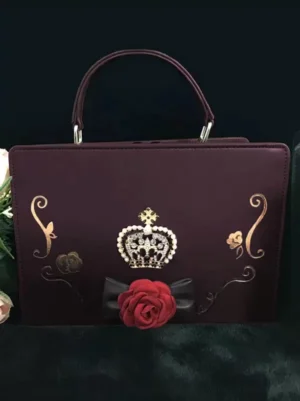 burgundy-lolita-handbag-crystal-crown-red-rose-bow-gold-scroll-motifs-front-flat-view