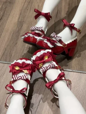 Burgundy Lolita Mary Jane pumps overhead view showing multiple decorative bows gold buckles and scalloped lace trim on white stockinged feet