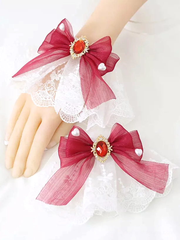 Burgundy maroon organza bow lolita wrist accessory with red gemstone ornament and pearl-accented embroidered lace base