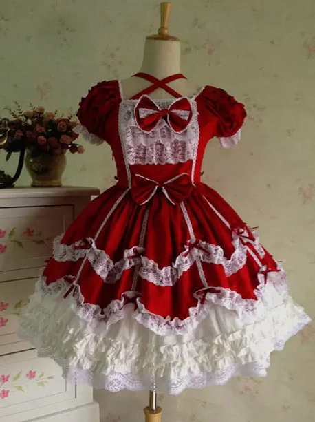 Burgundy rococo lolita JSK dress with layered ruffles and bow decorations front view on dress form