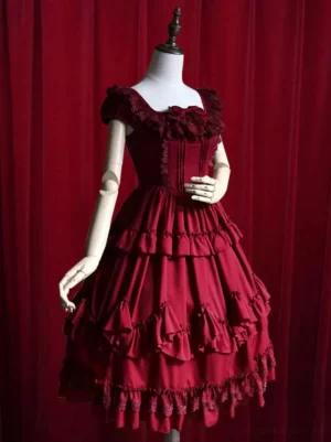 Burgundy sweet lolita dress front view with square ruffle collar, decorative bow, and voluminous ruffled midi skirt on display mannequin