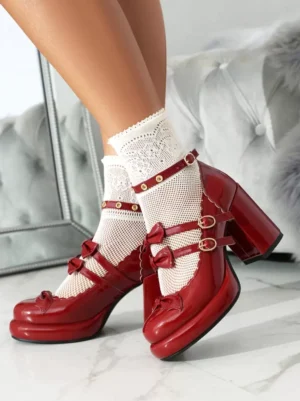 Burgundy Sweet Lolita platform heels with double bow straps and metal buckle details, patent leather chunky heel shown from rear side view