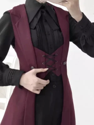 Close-up detail of burgundy Gothic Ouji waistcoat corset lace-up front with decorative buttons and Victorian-inspired construction