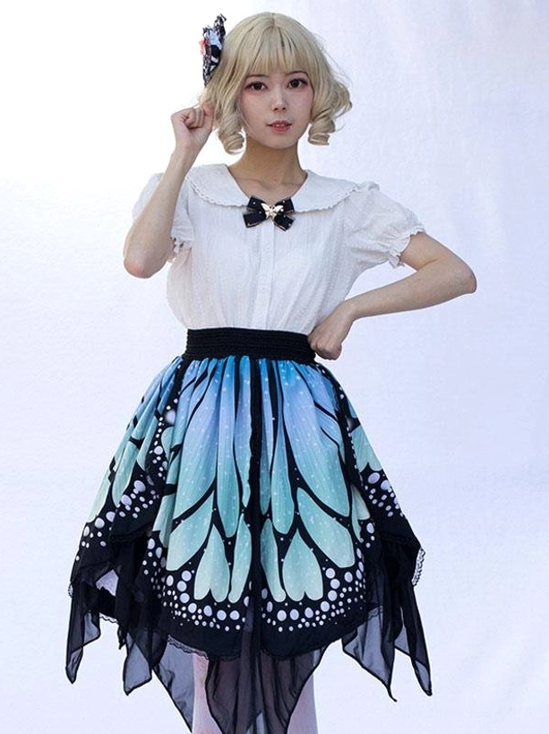 Lolita butterfly half skirt front standing view on model with floral hair accessory wearing white blouse, featuring blue-black butterfly pattern and high waist black band