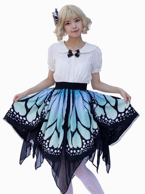 Sweet lolita butterfly half skirt full-body front view on model wearing white blouse, featuring blue-black butterfly wing print and irregular handkerchief hem with black waistband