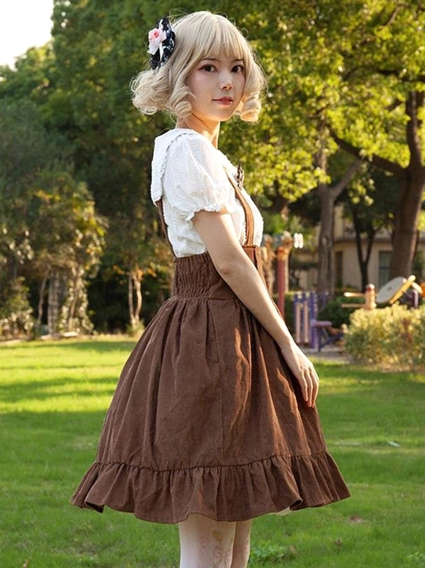 Camel lolita skirt outdoor side view corduroy fabric texture flowy ruffled hem park background