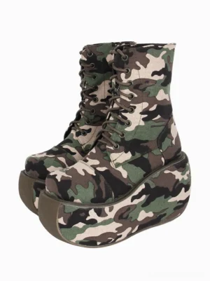 Camouflage canvas platform combat boots with woven camo pattern, chunky flatform sole, round toe, and brown laces - front three-quarter view showcasing gothic lolita style