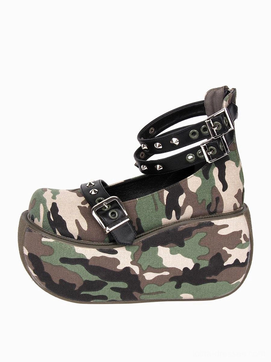 Single camouflage platform lolita pump side profile showing thick platform sole dual studded ankle straps and full shoe construction