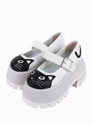 White-sole cat-themed Gothic Lolita platform Mary Jane sandal featuring black cat face appliqué and silver buckle, front three-quarter angle on neutral background