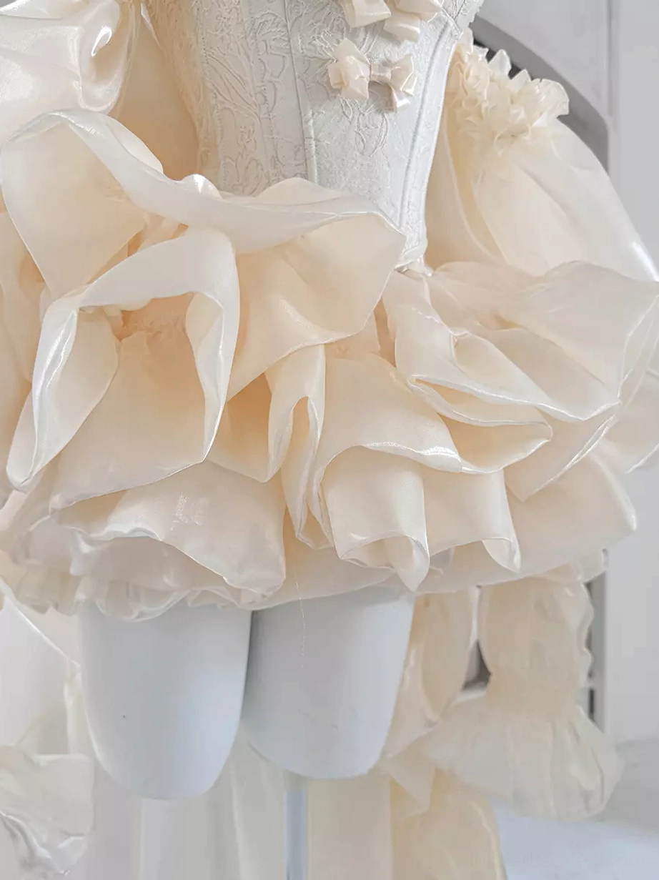 Champagne ballet lolita dress full-body shot displaying ruffled layers, dramatic train sweep, strapless design, and rococo silhouette proportions