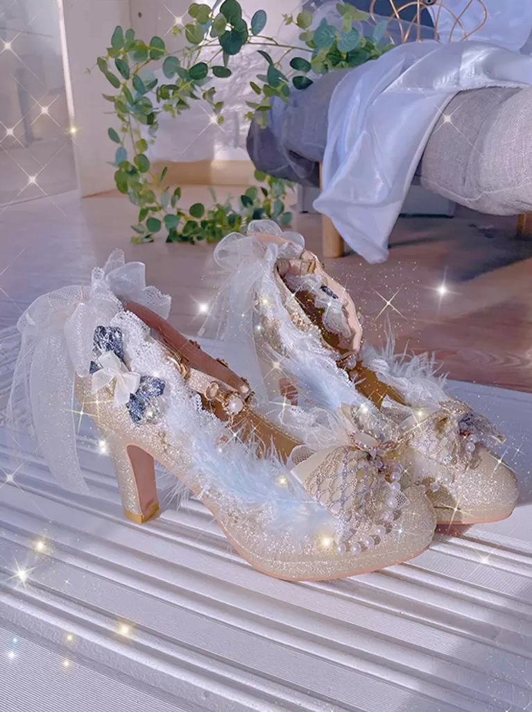 Side three-quarter view of champagne lolita high heel shoes featuring tulle bow, glitter leather upper, and feather trim details in home setting