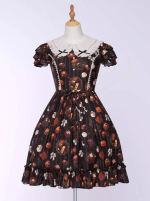 chocolate cake sweet lolita dress full front view peter pan collar white ruffled neckline black bow accents layered flutter sleeves chocolate dessert print
