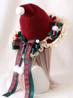 Christmas witch lolita bonnet rear left angle view with wine red fabric beige lace trim plaid bow and white pom-poms on mannequin with pink wig