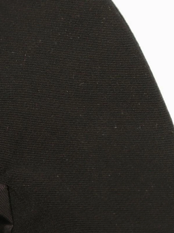 Classic black lolita dress fabric macro close-up highlighting solid black tightly woven polyester material with fine plain weave texture and superior quality construction