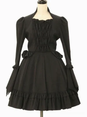 Classic black lolita dress full front view featuring puffed long sleeves, ruffled cuffs, ruched bust bodice, waist bow details, and ruffled hem on headless mannequin