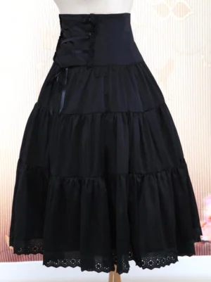 Classic black high-waist lolita long skirt with tiered ruffles and side corset lacing, front-left oblique view on mannequin showcasing multi-layered gathered skirt and intricate lace hem details
