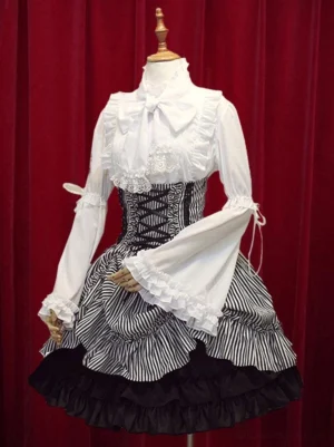 Classic black and white striped lolita skirt with high waist corset lace-up front detail, front three-quarter view showing white ruffled bell sleeves and lace-up waist corseting