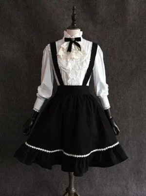 Classic lolita black chiffon suspender skirt front view with ruffled white lace hem displayed on dress form paired with white blouse and black gloves