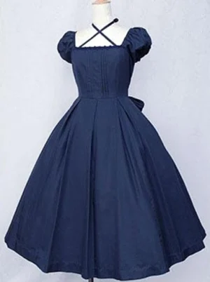 Classic Lolita cotton one-piece dress dark navy color front view showing puff sleeves cross halter square neckline pleated bodice and flared skirt on dress form