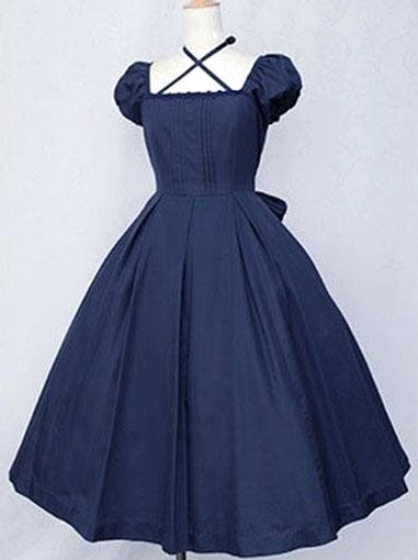 Classic Lolita cotton one-piece dress dark navy color front view showing puff sleeves cross halter square neckline pleated bodice and flared skirt on dress form