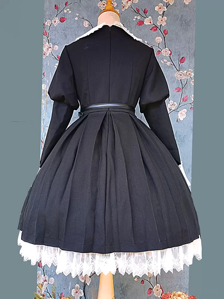 Back view of classic long-sleeve lolita dress on dress form showing pleated skirt construction, waist belt detail, and tiered lace hemline from behind